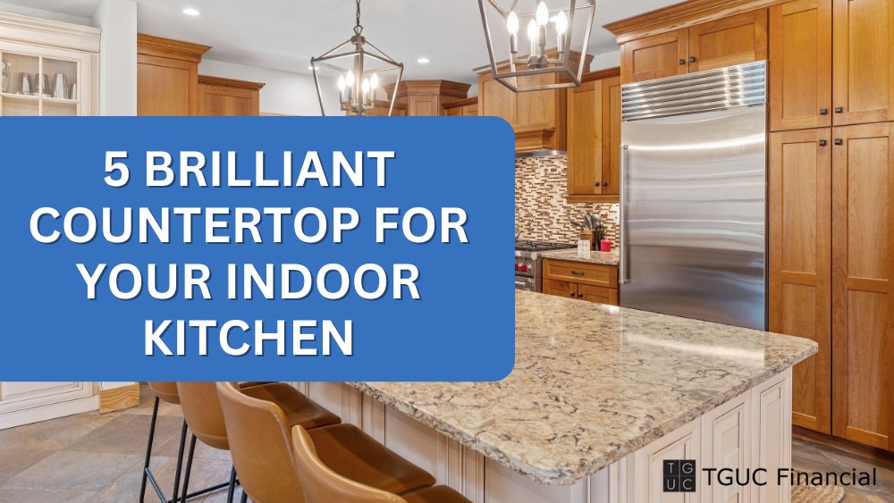 a kitchen with a stainless steel refrigerator and a large island